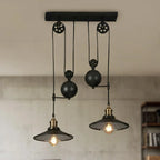 Suspension industrielle en métal noir avec poulie pour cuisine