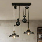 Suspension industrielle en métal noir avec poulie pour cuisine