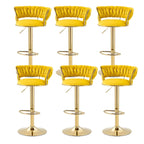 Tabouret de bar pivotant réglable à dossier bas et base dorée