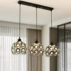 Suspension moderne à 3 lumières ronde en cristal et métal noir avec dôme