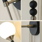 Applique murale moderne noire à globe avec abat-jour en verre blanc