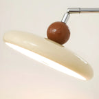 Applique murale moderne beige à abat-jour rond et bras articulé argenté