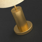 Lampe de table en forme de tonneau, en métal doré et tissu, à brancher