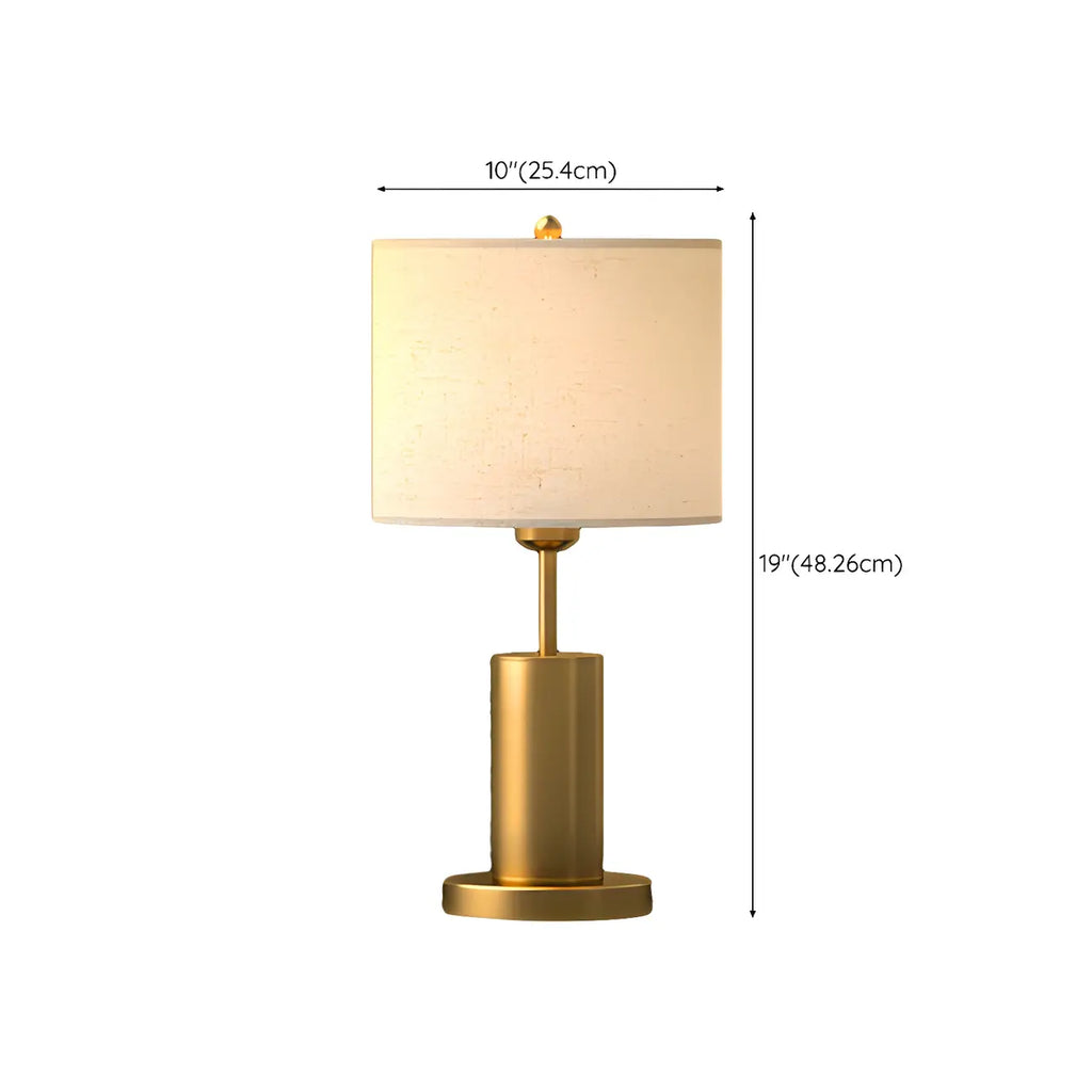 Lampe de table en forme de tonneau, en métal doré et tissu, à brancher