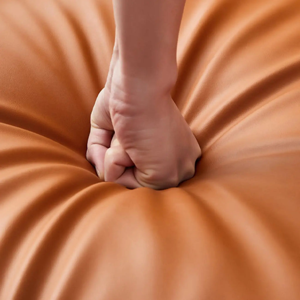 Fauteuil pivotant moderne en similicuir orange