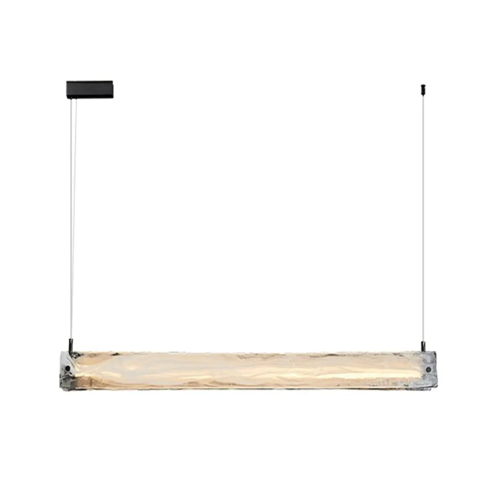 Suspension élégante en verre pour îlot de cuisine, avec éclairage LED à intensité variable.