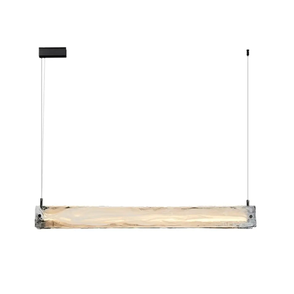 Suspension élégante en verre pour îlot de cuisine, avec éclairage LED à intensité variable.