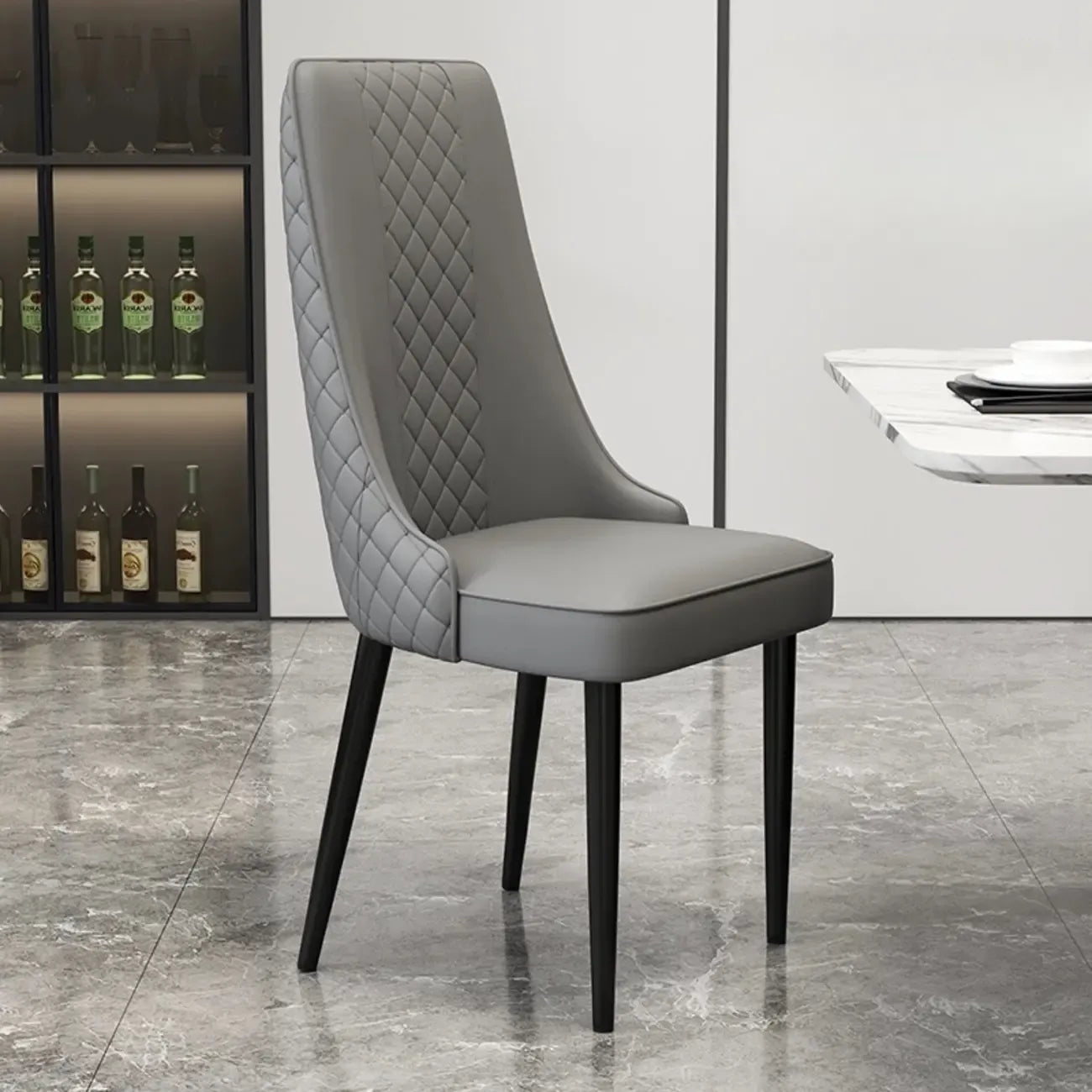 Chaise de salle à manger moderne en cuir avec dossier entièrement rembourré