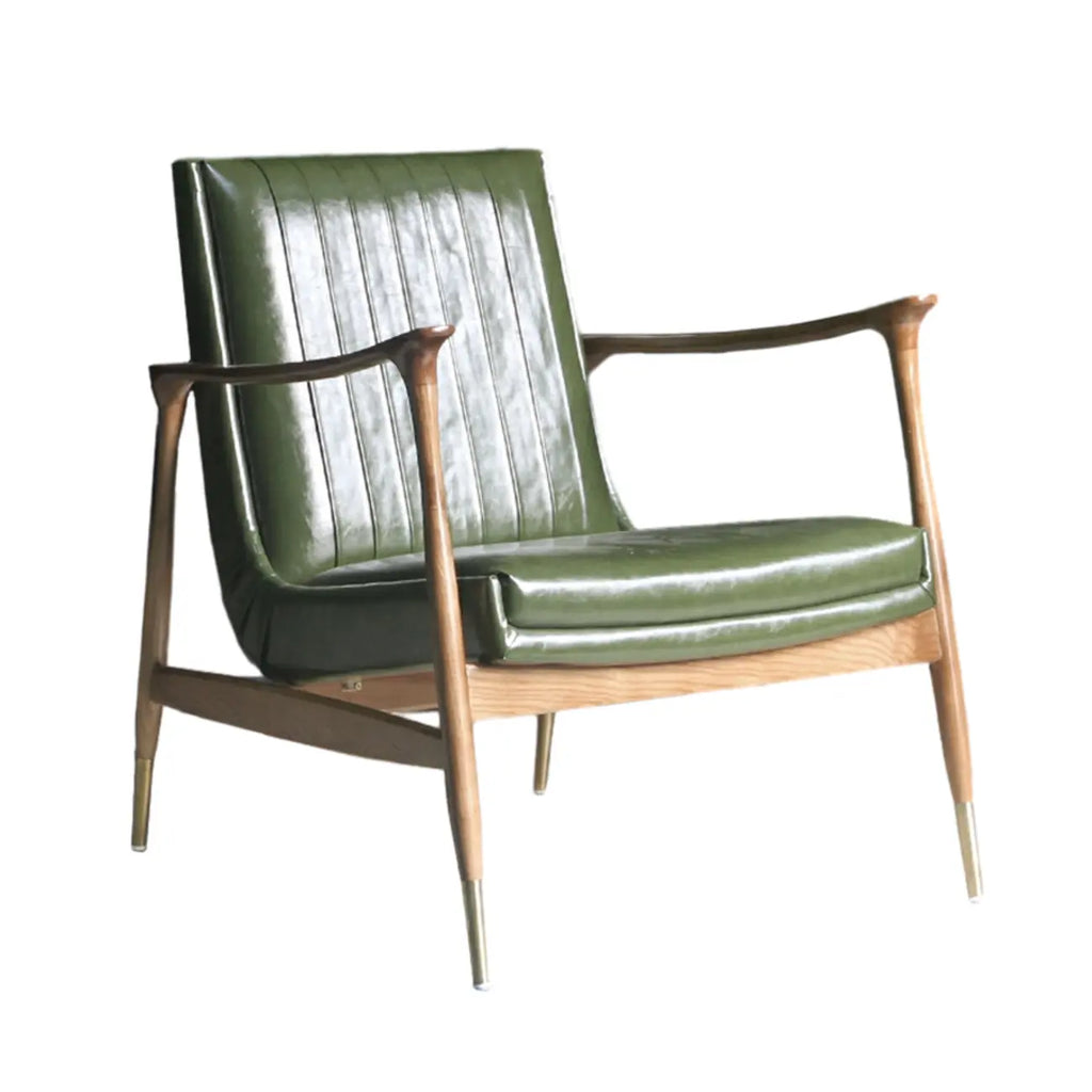 Fauteuil moderne en cuir vert avec dossier haut