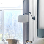 Applique murale noire à bras articulé en métal avec abat-jour en tissu blanc