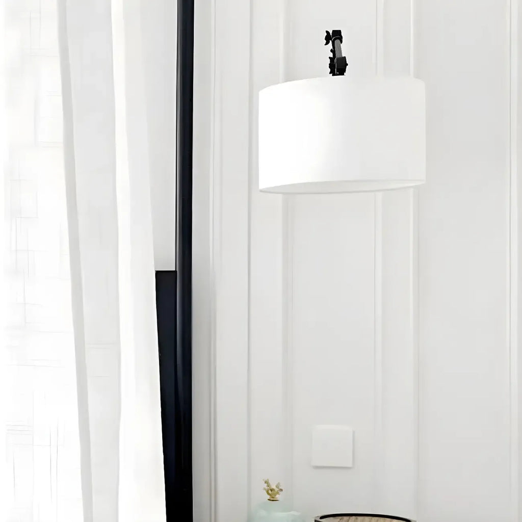 Applique murale noire à bras articulé en métal avec abat-jour en tissu blanc