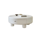 Table basse ronde élégante en bois crème avec tiroirs