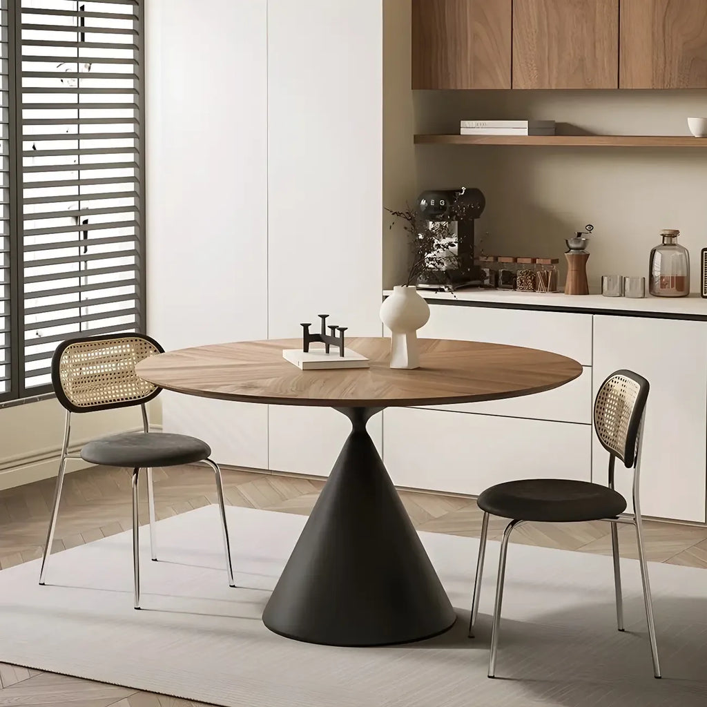Table de salle à manger ronde en bois brun avec pied en métal noir
