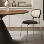 Table de salle à manger ronde en bois brun avec pied en métal noir