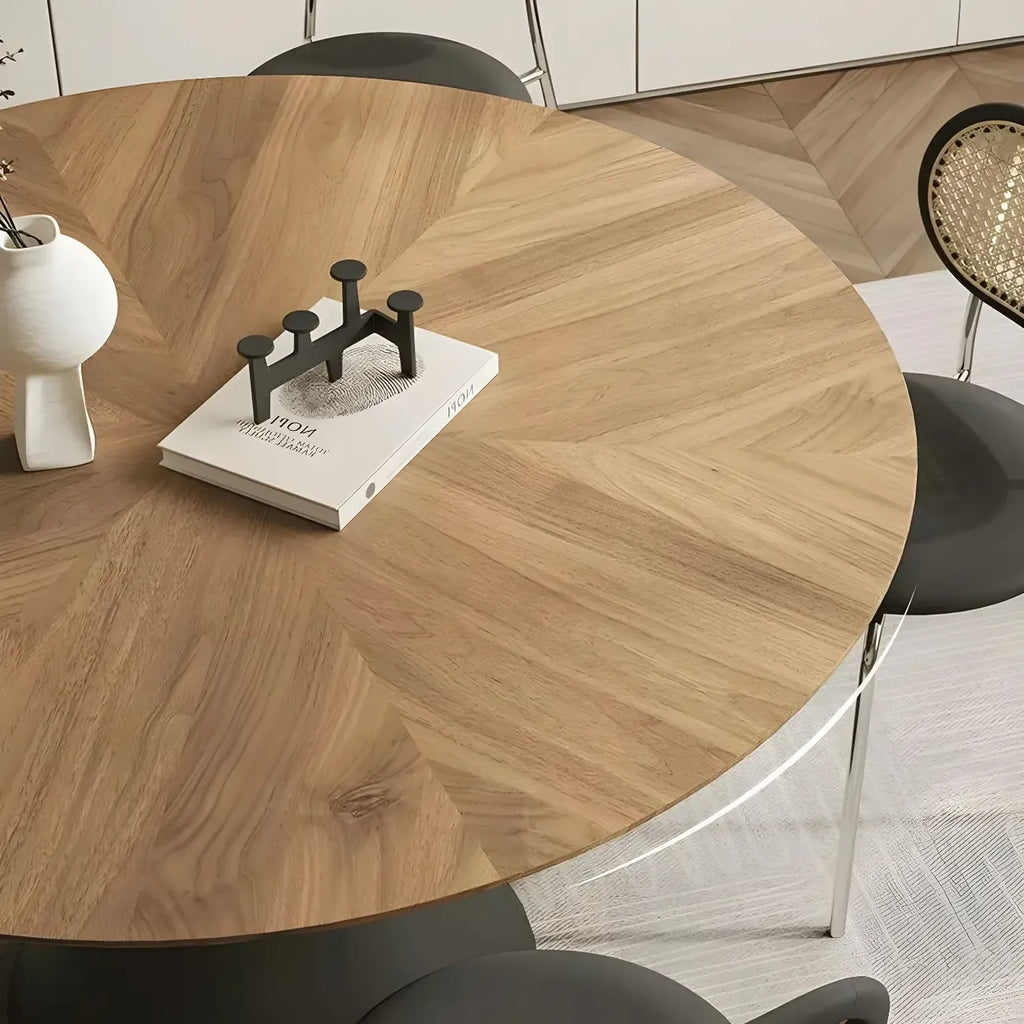 Table de salle à manger ronde en bois brun avec pied en métal noir