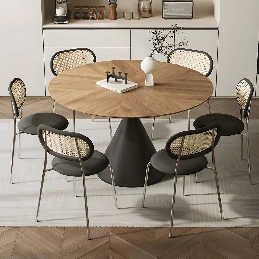 Table de salle à manger ronde en bois brun avec pied en métal noir