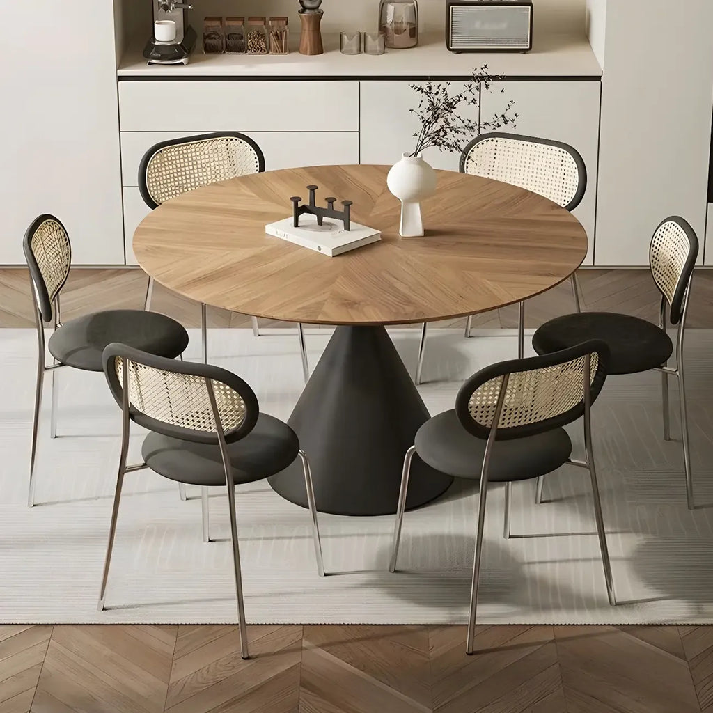 Table de salle à manger ronde en bois brun avec pied en métal noir