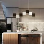 Îlot de cuisine moderne en forme de cube noir avec éclairage LED dimmable