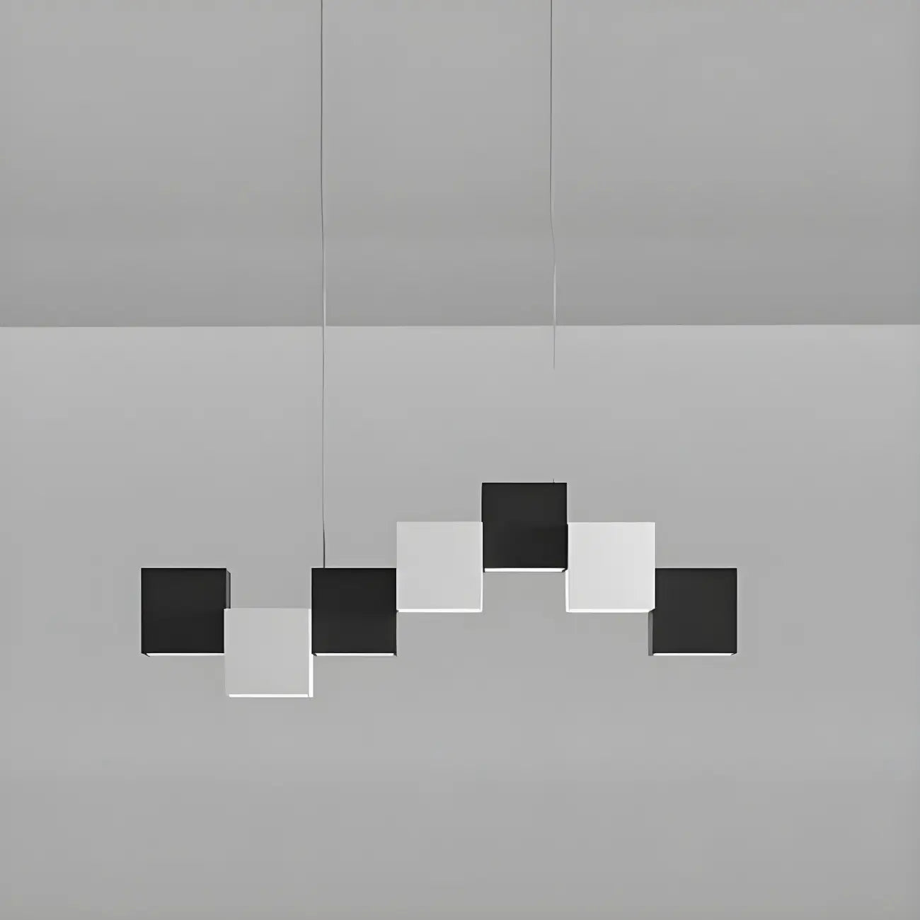Îlot de cuisine moderne en forme de cube noir avec éclairage LED dimmable