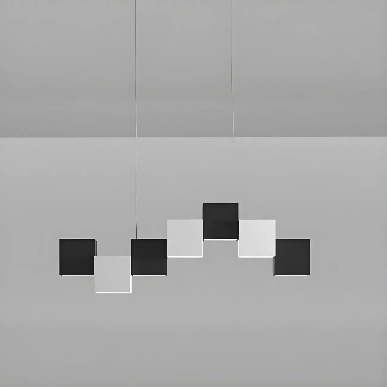 Îlot de cuisine moderne en forme de cube noir avec éclairage LED dimmable