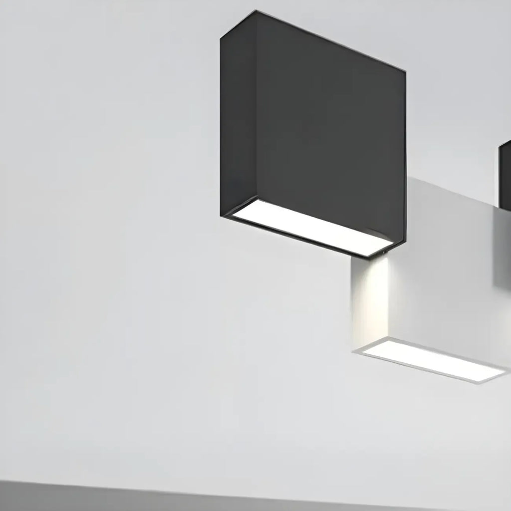 Îlot de cuisine moderne en forme de cube noir avec éclairage LED dimmable