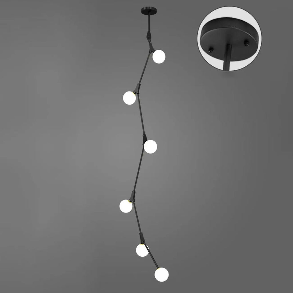 Lustre moderne doré à branches, globe en verre et tige de suspension pour escalier