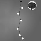 Lustre moderne doré à branches, globe en verre et tige de suspension pour escalier