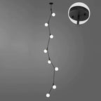 Lustre moderne doré à branches, globe en verre et tige de suspension pour escalier