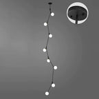Lustre moderne doré à branches, globe en verre et tige de suspension pour escalier