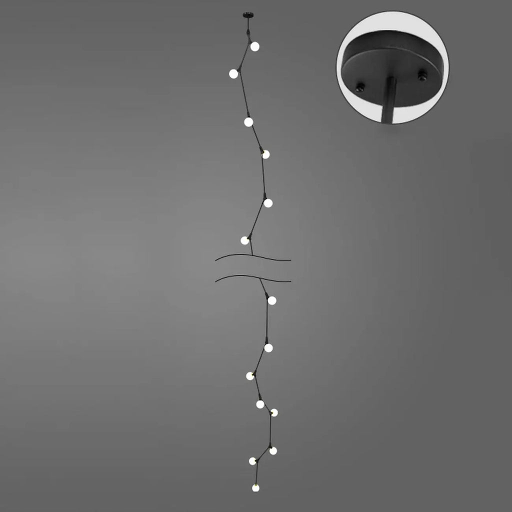 Lustre moderne doré à branches, globe en verre et tige de suspension pour escalier