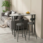 Table de bar moderne aux formes libres avec plateau en pierre blanche et structure en fer