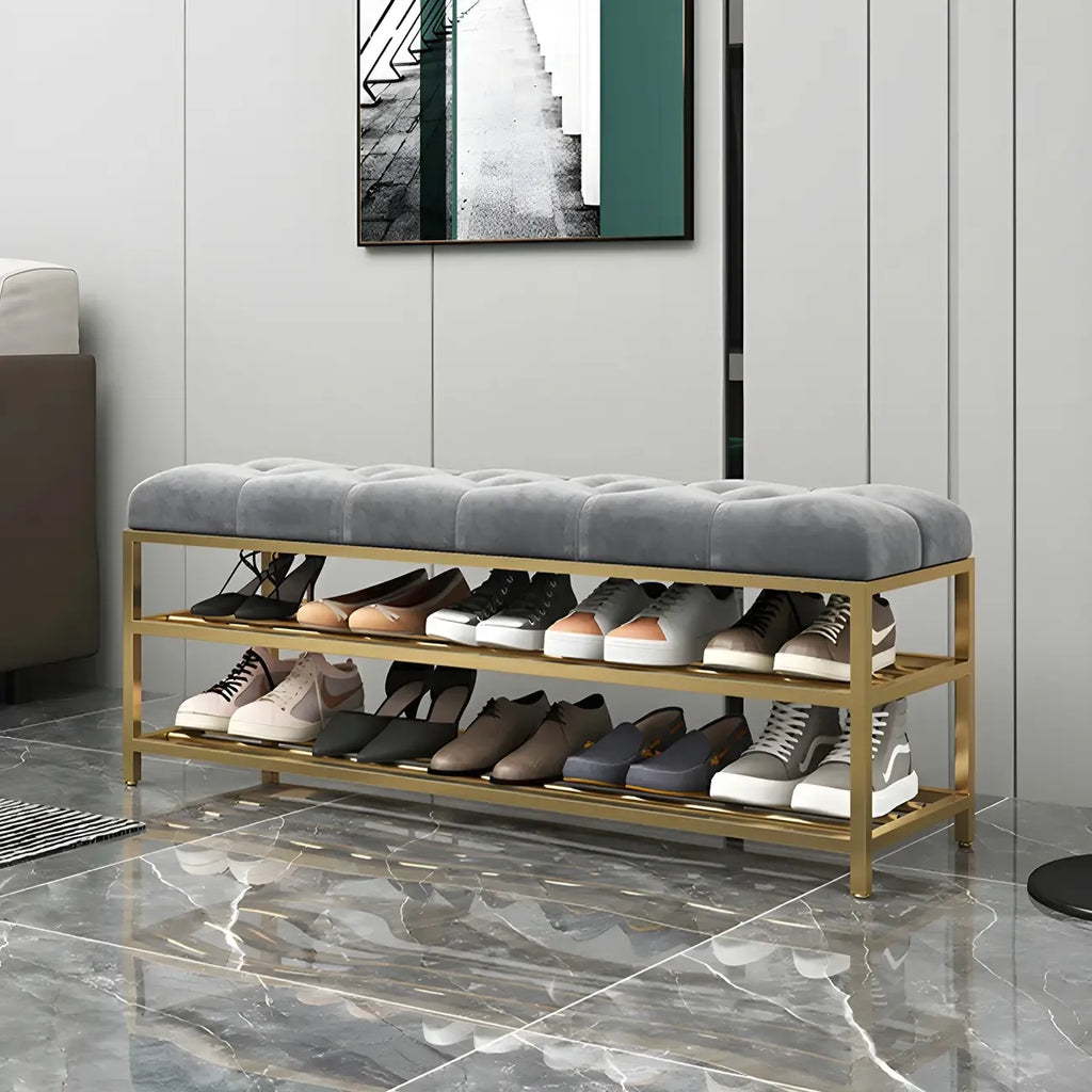 Étagère à chaussures grise capitonnée avec cadre doré pour entrée