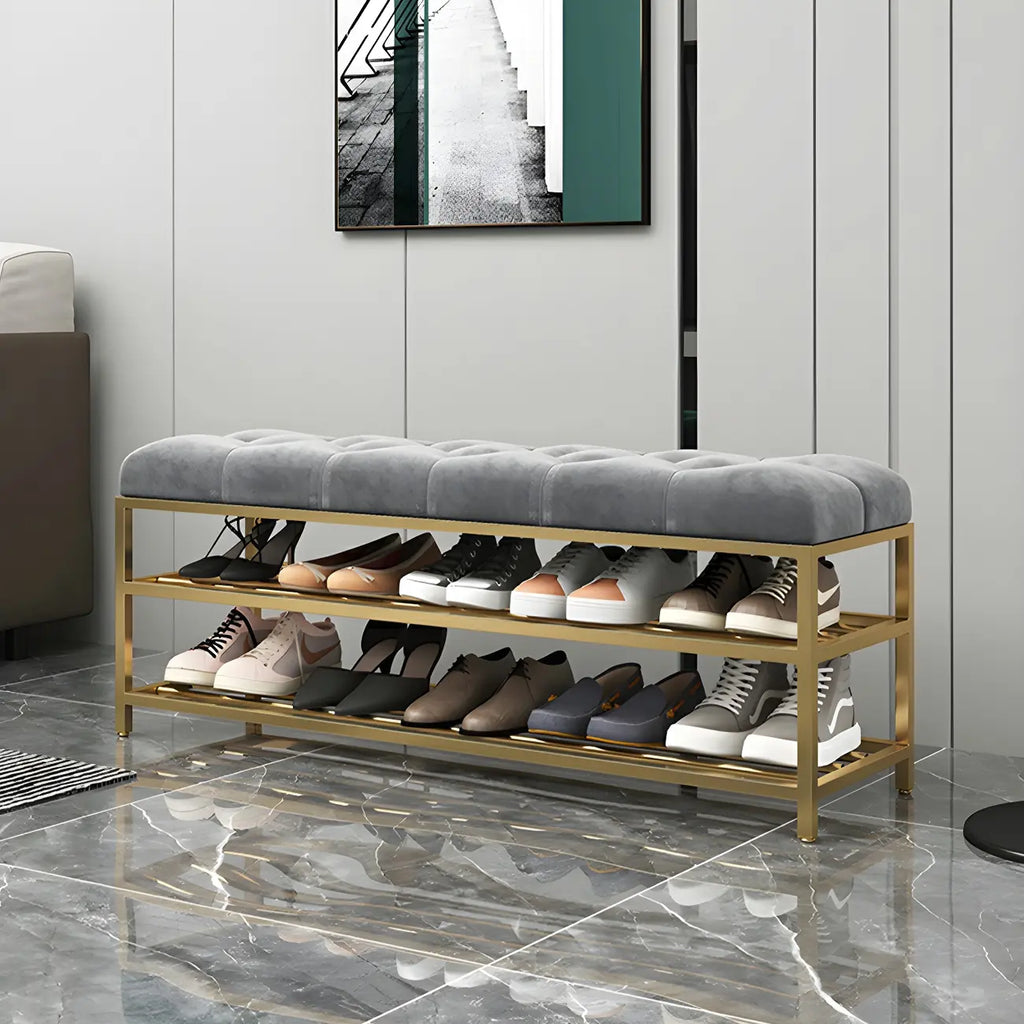 Étagère à chaussures grise capitonnée avec cadre doré pour entrée