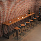 Table de bar rectangulaire en pin brun avec piètement en acier