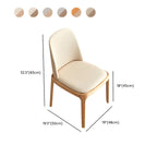 Chaise de salle à manger à dossier plein en bois crème et similicuir.