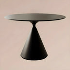 Table de salle à manger ronde avec plateau en pierre et piètement en métal, idéale pour les petits espaces.