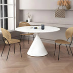 Table de salle à manger ronde avec plateau en pierre et piètement en métal, idéale pour les petits espaces.