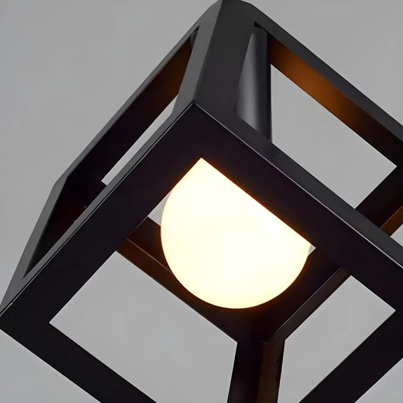 Suspension géométrique industrielle en métal noir pour îlot de cuisine