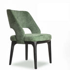 Chaise de salle à manger moderne en coton et lin vert, recouverte d'un revêtement en coton.