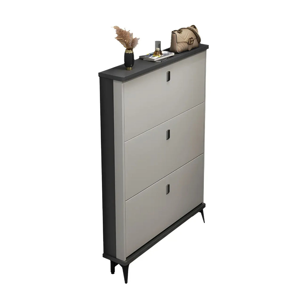 Armoire à chaussures d'entrée grise et blanche à façade rabattable