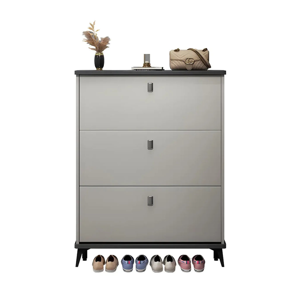 Armoire à chaussures d'entrée grise et blanche à façade rabattable