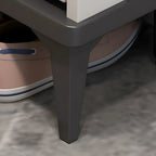 Armoire à chaussures d'entrée grise et blanche à façade rabattable