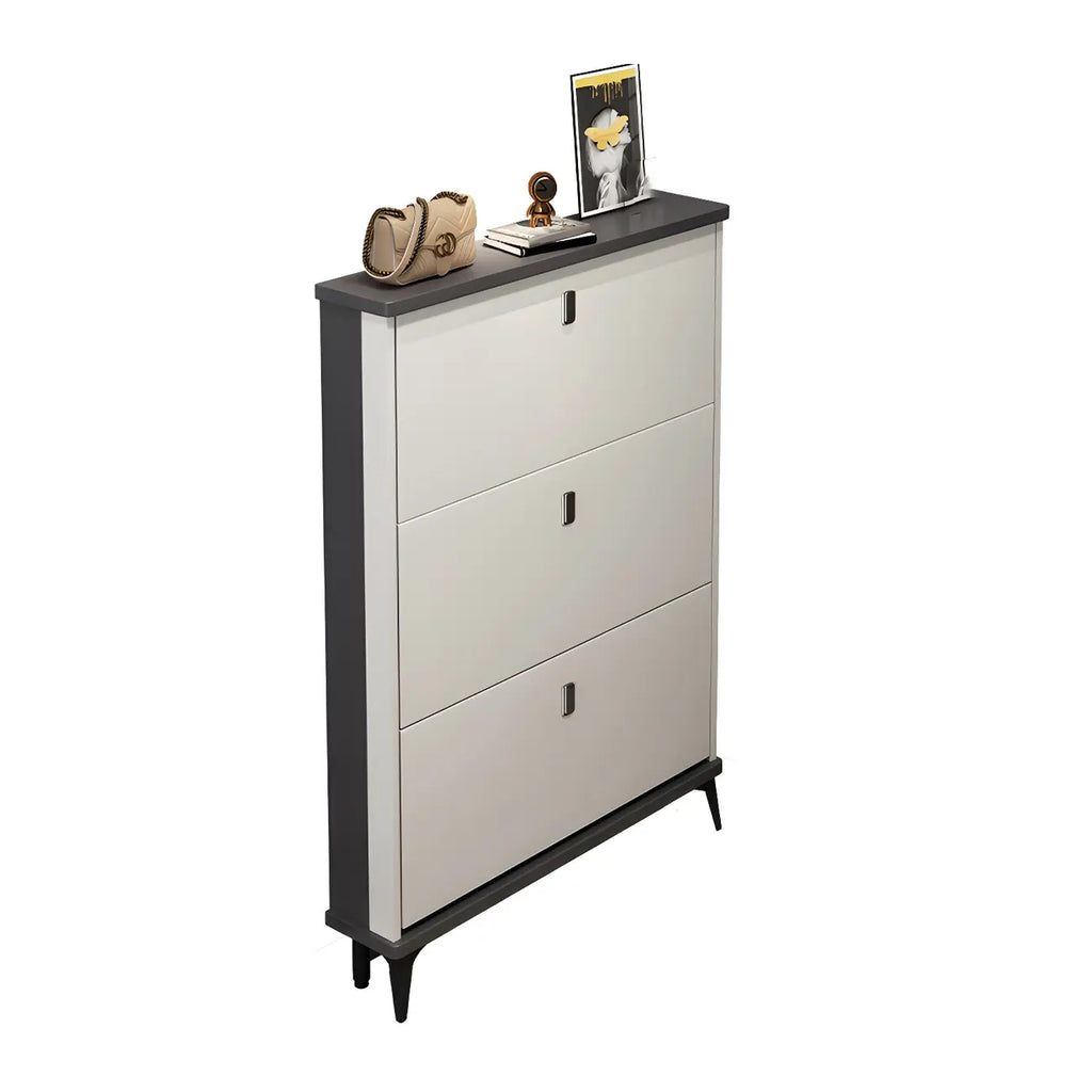 Armoire à chaussures d'entrée grise et blanche à façade rabattable