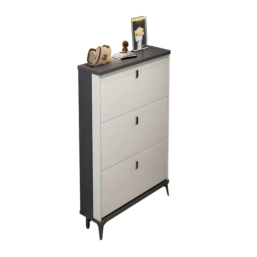 Armoire à chaussures d'entrée grise et blanche à façade rabattable