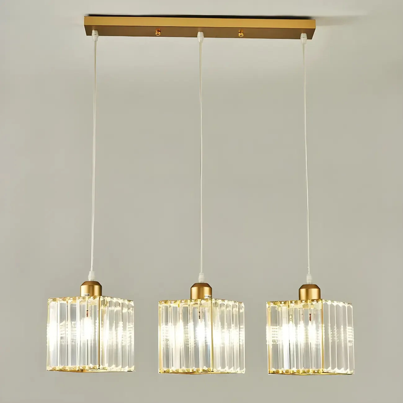 Lampada a sospensione da isola geometrica a 3 luci in cristallo dorato per cucina