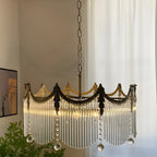 Lustre élégant en cristal transparent et peigne en métal doré
