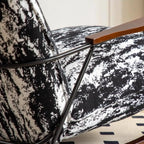 Fauteuil à bascule moderne avec revêtement en fausse fourrure de vison et structure en métal