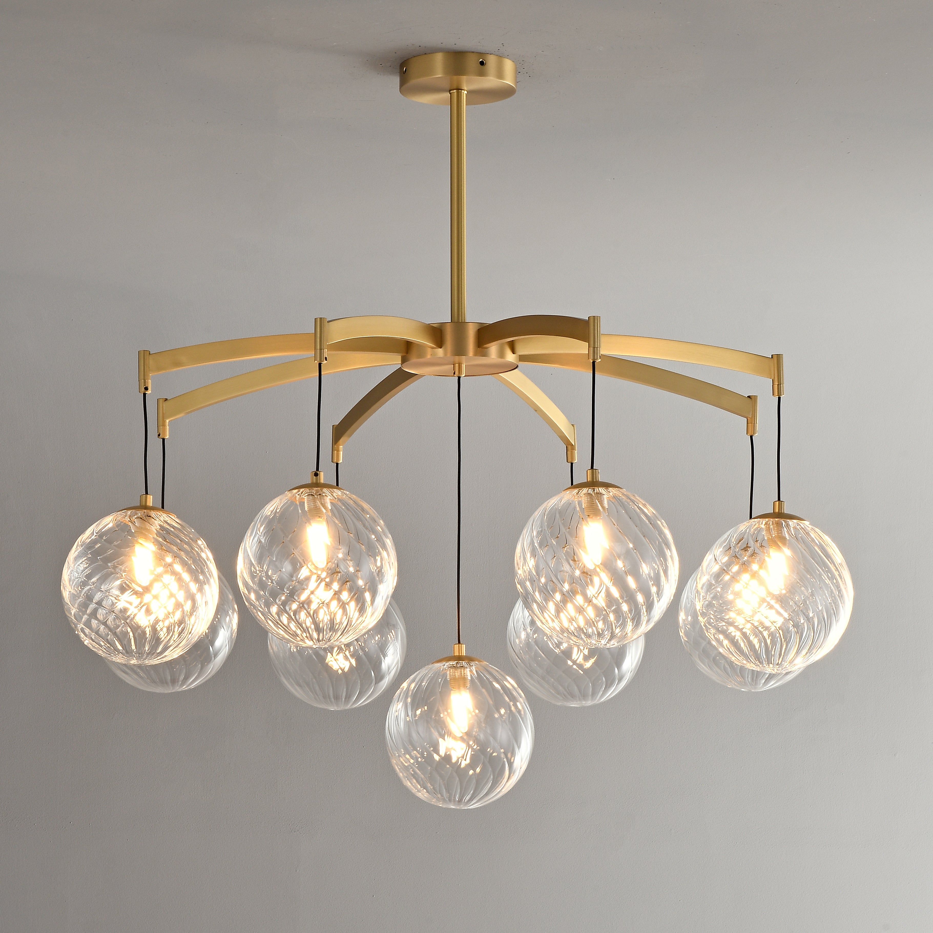 Lustre sphérique en verre doré et cristal, design moderne et élégant