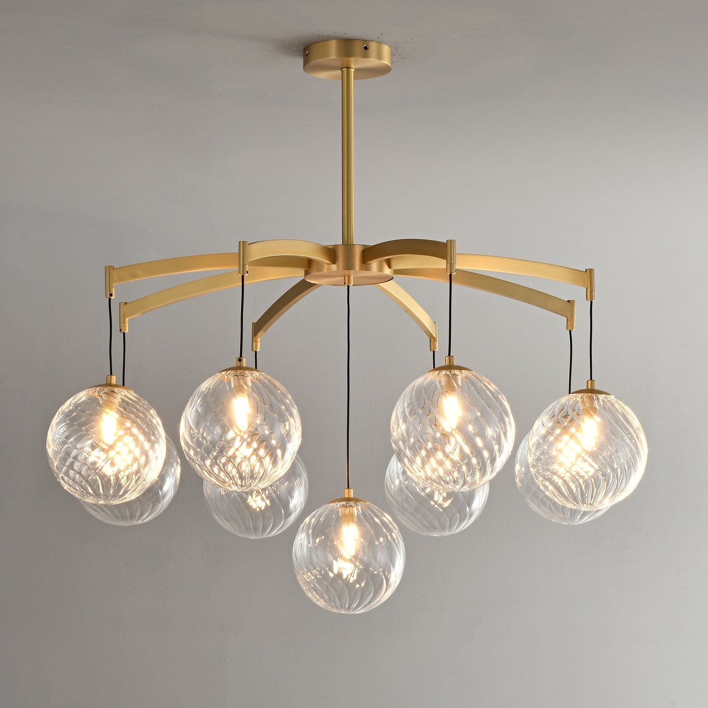 Lustre sphérique en verre doré et cristal, design moderne et élégant