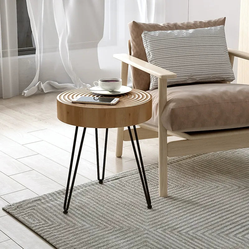 Tavolino scandinavo rotondo a 4 gambe con venature del legno